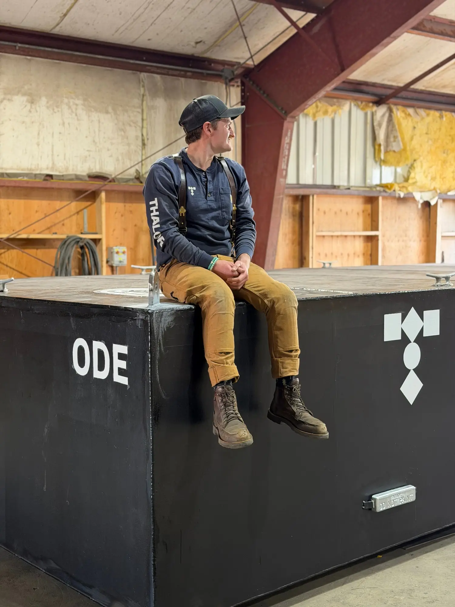 Charlie Campbell sitting on Ode-001, Thalor’s first work platform.
